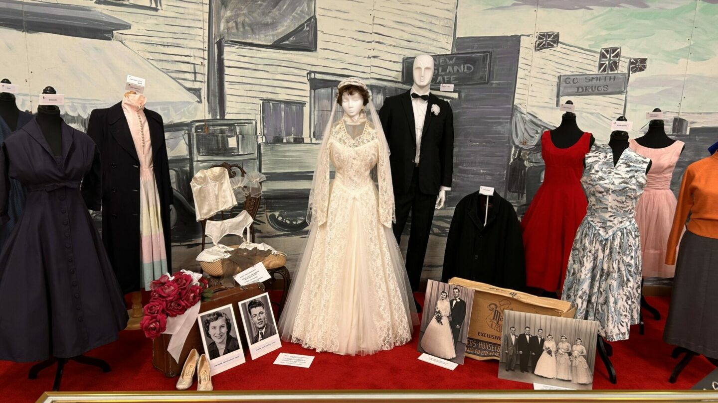 1956's  Fashions - 1956 Wedding Ensemble original gown of silky polyester embroidery on tuille organza pleated panel dress and silk tuille embroidered edge veil and fine wool and rayon black suit along with all original trousseau accessories